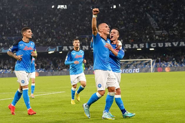 NAPLES, ITALY - OCTOBER 26: Leo Skiri Ostigard of SSC Napoli celebrates with team mates Giacomo Raspadori and Giovanni Di Lorenzo after scoring his goal ,during the UEFA Champions League group A match between SSC Napoli and Rangers FC at Stadio Diego Armando Maradona on October 26, 2022 in Naples, Italy. SPO 