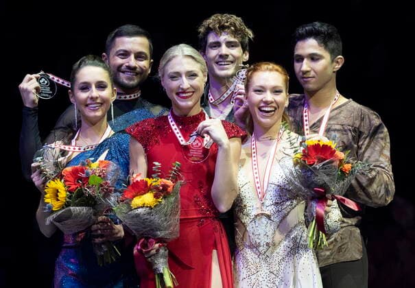 October 29, 2022, Mississauga, ON, Canada: Ice dance gold medalists Canada™s Piper Gilles and Paul Poirier, centre, silver medalists Lilah Fear and Lewis Gibson of Great Britain, left, and bronze medalists Canada s Marjorie Lajoie and Zachary Lagha react during victory ceremonies at Skate Canada International in Mississauga, Ont., on Saturday, October 29, 2022. Piper Gilles Paul Poirier Marjorie Lajoie Zachary Lagha Lilah Fear Lewis Gibson - ZUMAc35_ 20221029_zaf_c35_138 Copyright: xPaulxChiassonx