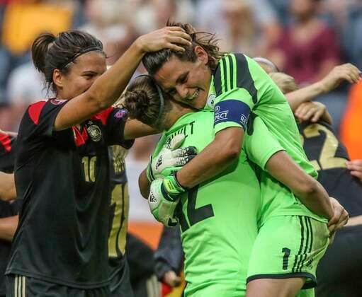 Germany s goalie Nadine Angerer, right, embraces their back up goalie Almuth Schult, middle, after the victory by 1 0 in the UEFA Women s Euro soccer final between Germany and Norway at the Friends Arena in Stockholm on July 28, 2013 STOCKHOLM SWEDEN xx  Copyright: xSORENxANDERSSONx SWEDEN WOMEN EURO SOCCER GER VS NOR