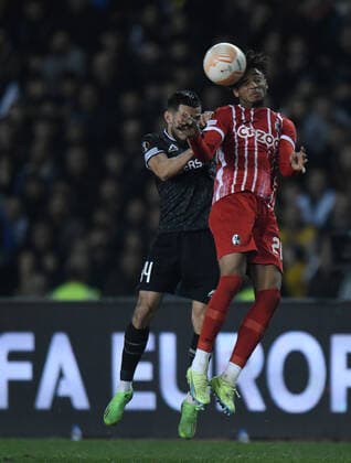 Elvin Dzhafarquliyev of Qaraba? FK and Kevin Schade of SC Freiburg battle for the header during the UEFA Europa League Group G match between Qaraba? FK and SC Freiburg at The Tofiq Bahramov Republican Stadium in Baku, Azerbaijan  Copyright: xx
