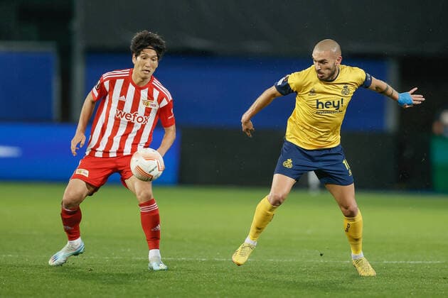 Berlin s Genki Haraguchi and Union s Teddy Teuma fight for the ball during a soccer match between Belgian Royale Union Saint-Gilloise and German Union Berlin, Thursday 03 November 2022 in Leuven, on day 6 6 of the Uefa Europa League group stage. BRUNOxFAHY  x48592543x