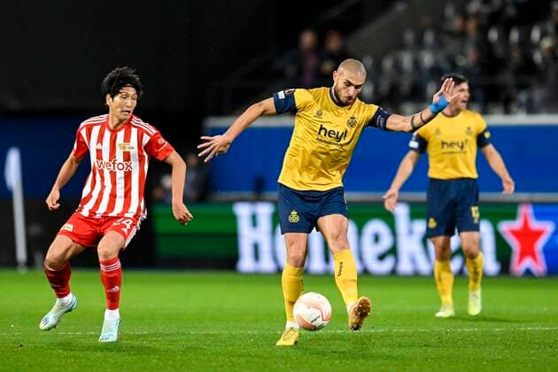 LEUVEN, BELGIUM - NOVEMBER 03 : Teuma Teddy midfielder of Union St-Gilloise pictured in action with Haraguchi Genki midfielder of Union Berlin during UEFA Europa league match between Union St-Gilloise and Union Berlin at the King Power Stadium at den Dreef November 3, 2022 in Leuven, Belgium, 3 11 2022 ( Union ST-Gilloise v Union Berlin PhotoNews Panoramic 