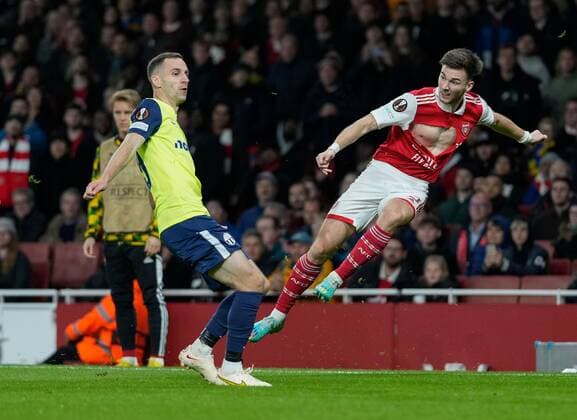 Mandatory Credit: Photo by Dave Shopland Shutterstock (13602543ah) Kieran Tierney of Arsenal crosses with ripped shirt Arsenal v FC Zurich, UEFA Europa League, Group A, Football, Emirates Stadium, London, UK - 03 Nov 2022 EDITORIAL USE ONLY No use with unauthorised audio, video, data, fixture lists, club league logos or live services. Online in-match use limited to 120 images, no video emulation. No use in betting, games or single club league player publications. Arsenal v FC Zurich, UEFA Europa League, Group A, Football, Emirates Stadium, London, UK - 03 Nov 2022 EDITORIAL USE ONLY No use with unauthorised audio, video, data, fixture lists, club league logos or live services. Online in-match use limited to 120 images, no video emulation. No use in betting, games or single club league player publications. Copyright: xDavexShopland Shutterstockx 13602543ah