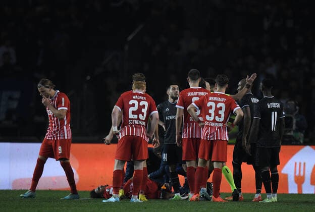 SC Freiburg react as Kevin Schade lies on the floor with an injury during the UEFA Europa League Group G match between Qaraba? FK and SC Freiburg at The Tofiq Bahramov Republican Stadium in Baku, Azerbaijan  Copyright: xx