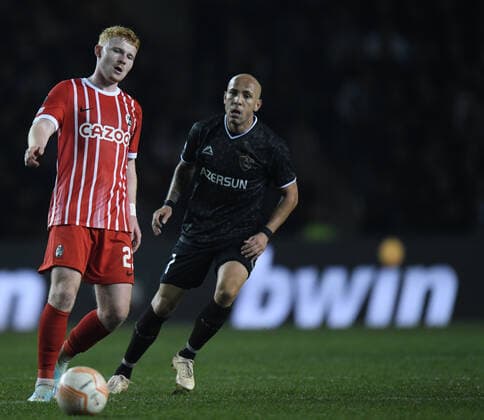 Richard Almeida of Qaraba? FK pressures Robert Wagner of SC Freiburg as he passes the ball during the UEFA Europa League Group G match between Qaraba? FK and SC Freiburg at The Tofiq Bahramov Republican Stadium in Baku, Azerbaijan  Copyright: xx