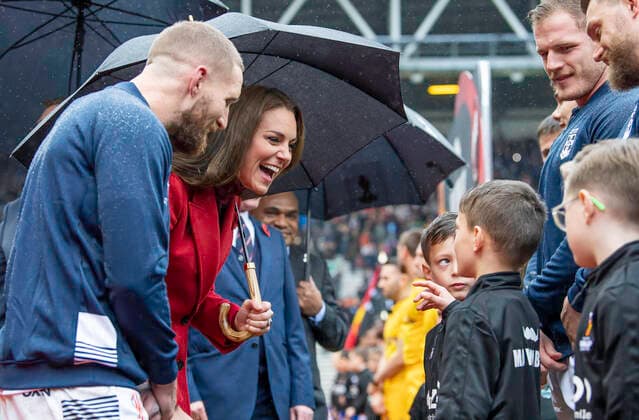Picture by Allan McKenzie SWpix.com - 05 11 2022 - Rugby League - Rugby League World Cup 2021 - HRH The Princess of Wales - England v Papua New Guinea - DW Stadium, Wigan, England - HRH The Princess of Wales meets the mascots with England Captain Sam Tomkins England v Papua New Guinea SWP-1907-0011