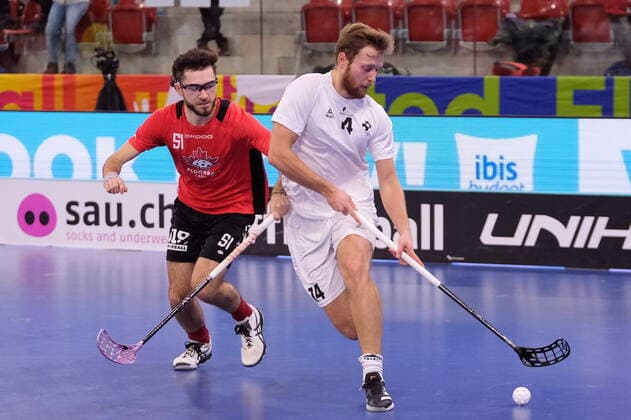 IFF Men s World Floorball Championship 2022 Canada vs Denmark - Canada Defender Francis Lavergne (51) and Denmark Forward Lukas Eldholm (14) Winterthur AXA Arena Zürich Schweiz Copyright: xSergioxBrunettix