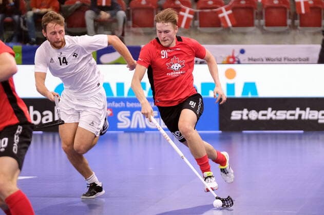 IFF Men s World Floorball Championship 2022 Canada vs Denmark - Canada Forward Valtteri Viitakoski (91) and Denmark Forward Lukas Eldholm (14) Winterthur AXA Arena Zürich Schweiz Copyright: xSergioxBrunettix