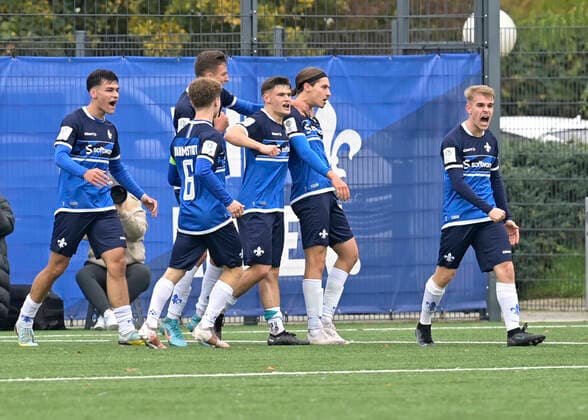 12 11 2022 football season 2022 2023 A Junior Bundesliga South Southwest SV Darmstadt 98 1 FC Heidenheim 2 0 renewed goal celebration center left 11 Mike Borger and center right 10 Luca Kaiser Darmstadt photo Peter Henrich Darmstadt Hesse Germany