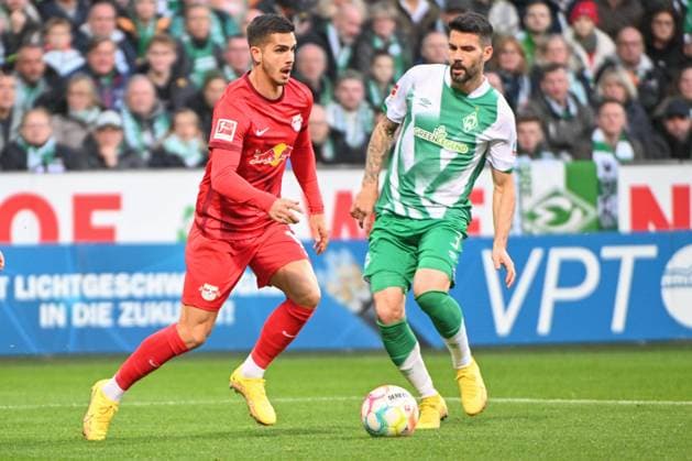 f l in duel Andre Silva RB Leipzig 19 and Anthony Jung SV Werder Bremen 3 , SV Werder Bremen RB Leipzig, football, Bundesliga, DFL, 12 11 2022 DFB regulations prohibit any use of photographs as image sequences and or quasi video Bremen Bremen Germany Copyright: xkolbert-press BurghardxSchreyerx