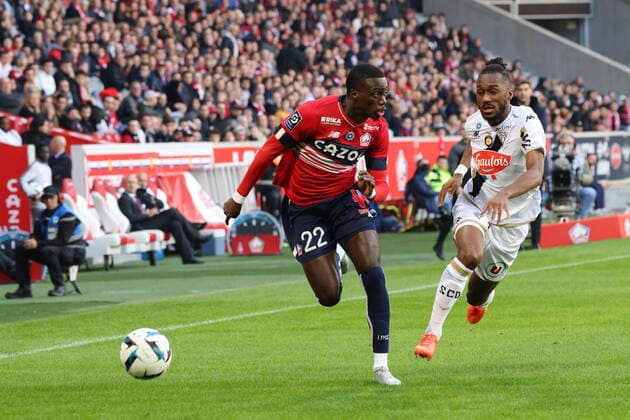 Fußball, OSC Lille - SCO Angers Timothy Weah lors du match LOSC - Angers - Ligue 1 Uber Eats - Decathlon Arena stade Pierre Mauroy Villeneuve d Ascq - 13 novembre 2022 FOOTBALL : LOSC vs ANGERS - Ligue1 Uber Eats - 13 11 2022 LaurentSanson Panoramic 