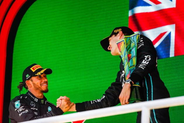 RUSSELL George (gbr), Mercedes AMG F1 Team W13, portrait celebrating his first win on the podium with HAMILTON Lewis (gbr), Mercedes AMG F1 Team W13, during the Formula 1 Heineken Grande Premio de Sao Paulo 2022, Sao Paulo Grand Prix Grand Prix 2022, 21st round of the 2022 FIA Formula One World Championship, WM, Weltmeisterschaft from November 11 to 13, 2022 on the Interlagos Circuit, in Sao Paulo, Brazil - F1 - SAO PAULO GRAND PRIX 2022 - RACE DPPI Panoramic  00122048__V2_2147