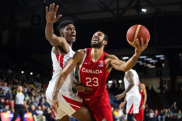 November 13, 2022, EDMONTON, AB, CANADA: Canada s Phil Scrubb (23) drives to the hoop past Panama s Eric Romero (16) during first half FIBA World Cup Qualifiers action in Edmonton, Sunday, Nov. 13, 2022. Canada News - November 13, 2022  - ZUMAc35_ 20221113_zaf_c35_140 Copyright: xJasonxFransonx