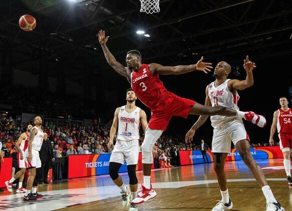 November 13, 2022, EDMONTON, AB, CANADA: Canada s Melvin Ejim (3) has the ball knocked away by Panama s Ernesto Ogivie (11) during second half FIBA World Cup Qualifiers action in Edmonton, Sunday, Nov. 13, 2022. Canada News - November 13, 2022  - ZUMAc35_ 20221113_zaf_c35_174 Copyright: xJasonxFransonx