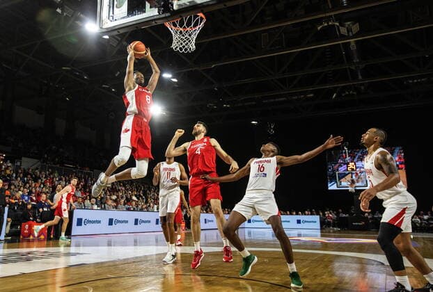November 13, 2022, EDMONTON, AB, CANADA: Canada s Jean-Victor Mukama (8) dunks the ball as Owen Klassen (4) and Panama s Eric Romero (16) react during second half FIBA World Cup Qualifiers action in Edmonton, Sunday, Nov. 13, 2022. Canada News - November 13, 2022  - ZUMAc35_ 20221113_zaf_c35_176 Copyright: xJasonxFransonx