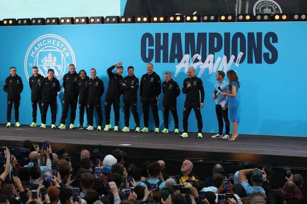 Mandatory Credit: Photo by Paul Greenwood Shutterstock (12952148cb) Manchester City manager Josep Guardiola and backroom staff during the Premier League trophy celebrations in Manchester City centre to celebrate winning the Premier League Manchester City Trophy Parade, Premier League, Football, Manchester, UK - 23 May 2022 EDITORIAL USE ONLY No use with unauthorised audio, video, data, fixture lists, club league logos or live services. Online in-match use limited to 120 images, no video emulation. No use in betting, games or single club league player publications. Manchester City Trophy Parade, Premier League, Football, Manchester, UK - 23 May 2022 EDITORIAL USE ONLY No use with unauthorised audio, video, data, fixture lists, club league logos or live services. Online in-match use limited to 120 images, no video emulation. No use in betting, games or single club league player publications.  Copyright: xPaulxGreenwood Shutterstockx 12952148cb