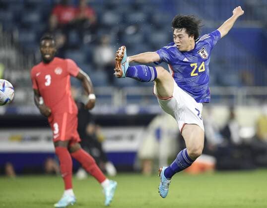 Football: Japan-Canada pre-World Cup friendly Yuki Soma of Japan scores in the first half of a friendly football match against Canada in Dubai on Nov. 17, 2022, ahead of the World Cup in Qatar. Canada won 2-1.  A14AA0001356519P 