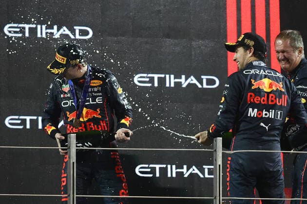 F1 Abu Dhabi Grand Prix Max Verstappen and Sergio Perez of Red Bull Racing on the podium after the Formula 1 Abu Dhabi Grand Prix at Yas Marina Circuit in Abu Dhabi, United Arab Emirates on November 20, 2022. Abu Dhabi United Arab Emirates  Copyright: xJakubxPorzyckix originalFilename:porzycki-f1abudha221120_npuzj.jpg