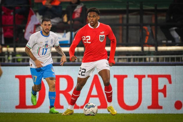 SOCCER - AUT vs ITA, test match VIENNA,AUSTRIA,20.NOV.22 - SOCCER - OEFB international test match, Austria vs Italy. Image shows Junior Adamu (AUT) and Matteo Politano (ITA).  GEPAxpictures xDavidxBitzan