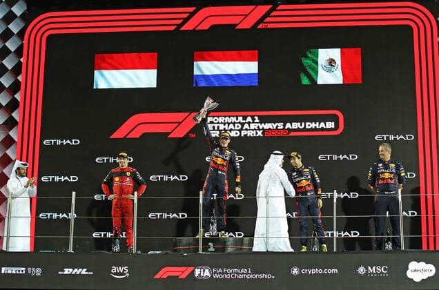 20th November 2022; Yas Marina Circuit, Yas Island, Abu Dhabi; 2nd placed Charles Leclerc (MON) Scuderia Ferrari F1-75, winner Max Verstappen (NED) Oracle Red Bull Racing RB18 and 3rd placed Sergio Perez (MEX) Oracle Red Bull Racing RB18 after the F1 Grand Prix Race day for Abu Dhabi F1 Race  ActionPlus12451431 HeulerxAndrey