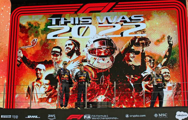 20th November 2022; Yas Marina Circuit, Yas Island, Abu Dhabi; 2nd placed Charles Leclerc (MON) Scuderia Ferrari F1-75, winner Max Verstappen (NED) Oracle Red Bull Racing RB18 and 3rd placed Sergio Perez (MEX) Oracle Red Bull Racing RB18 after the F1 Grand Prix Race day for Abu Dhabi F1 Race  ActionPlus12451444 HeulerxAndrey