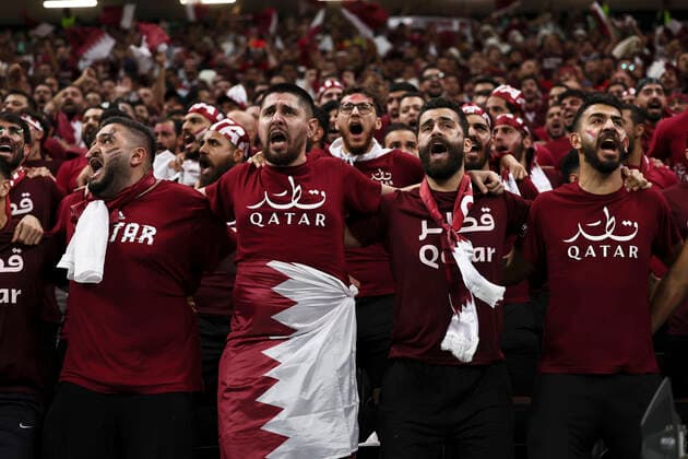 (221120) -- AL KHOR, Nov. 20, 2022 -- Fans of Qatar shout during the Group A match between Qatar and Ecuador at the 2022 FIFA World Cup, WM, Weltmeisterschaft, Fussball at Al Bayt Stadium in Al Khor, Qatar, Nov. 20, 2022. ) (SP)QATAR-AL KHOR-2022 WORLD CUP-GROUP A-QAT VS ECU LanxHongguang 