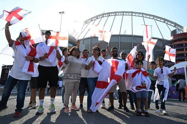 Qatar Soccer World Cup England - Iran 8320977 21.11.2022 England s supporters pose for a photo before the start of the Qatar 2022 World Cup Group B soccer match between England and Iran at the Khalifa International Stadium in Doha, Qatar. Grigory Sysoev Sputnik Doha Qatar  Copyright: xGrigoryxSysoevx