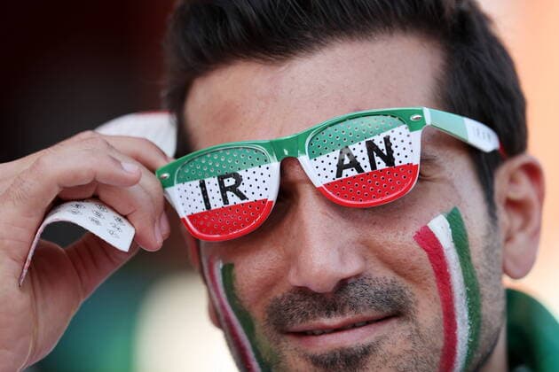 QATAR, DOHA - NOVEMBER 21, 2022: A Team Iran supporter is seen ahead of the 2022 FIFA World Cup, WM, Weltmeisterschaft, Fussball Group B football match between England and Iran at Khalifa International Stadium. Sergei Bobylev TASS  56005313