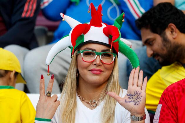 England v Iran 2022 FIFA World Cup, WM, Weltmeisterschaft, Fussball A female Iran fan with a Women Life Freedom message on her hand before the 2022 FIFA World Cup Group B match at Khalifa International Stadium, Al-Rayyan Content Not Available For UK Newspapers Copyright: xPaulxChestertonx FIL-17628-0020 UK Newspapers OUT