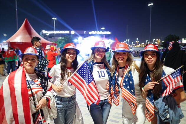 QATAR, AL RAYYAN - NOVEMBER 21, 2022: US fans anticipate their national team, Nationalteam s 2022 FIFA World Cup, WM, Weltmeisterschaft, Fussball Group B Round 1 football match against Wales at Ahmad bin Ali Stadium. Sergei Bobylev TASS  56012281