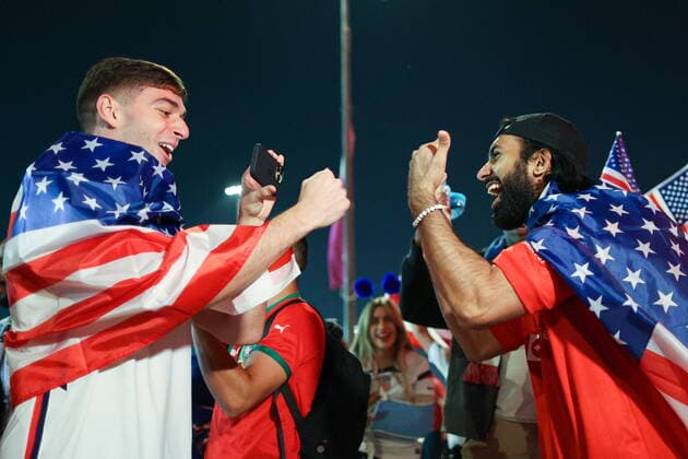 QATAR, AL RAYYAN - NOVEMBER 21, 2022: US fans anticipate their national team, Nationalteam s 2022 FIFA World Cup, WM, Weltmeisterschaft, Fussball Group B Round 1 football match against Wales at Ahmad bin Ali Stadium. Sergei Bobylev TASS  56012465