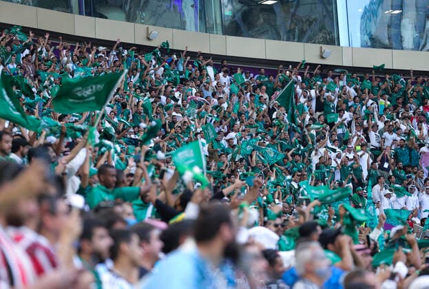 Argentina v Saudi Arabia 2022 FIFA World Cup, WM, Weltmeisterschaft, Fussball A Saudi Arabia fans celebrate and wave flags after their second goal during the 2022 FIFA World Cup Group C match at Lusail Stadium, Lusail Content Not Available For UK Newspapers Copyright: xPaulxChestertonx FIL-17637-0177 UK Newspapers OUT