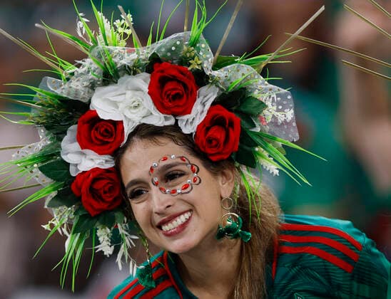 (221122) -- DOHA, Nov. 22, 2022 -- A fan cheers prior to the Group C match between Mexico and Poland of the 2022 FIFA World Cup, WM, Weltmeisterschaft, Fussball at Ras Abu Aboud (974) Stadium in Doha, Qatar, Nov. 22, 2022. ) (SP)QATAR-DOHA-2022 WORLD CUP-GROUP C-MEX VS POL WangxLili 