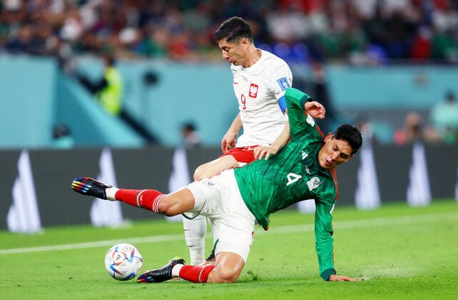Mandatory Credit: Photo by Kieran McManus Shutterstock (13626428p) Robert Lewandowski of Poland and Edson Alvarez of Mexico. Mexico v Poland, FIFA World Cup, WM, Weltmeisterschaft, Fussball 2022, Group C, Football, Stadium 974, Doha, Qatar - 22 Nov 2022 Editorial Use Only Mexico v Poland, FIFA World Cup 2022, Group C, Football, Stadium 974, Doha, Qatar - 22 Nov 2022 Editorial Use Only Copyright: xKieranxMcManus Shutterstockx 13626428p