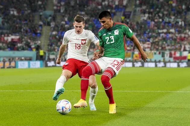 DOHA, 22-11-2022 Stadium 974, World Cup 2022 in Qatar game between Mexico vs Poland, Poland player Jakub Kaminski, Mexico player Jesus Gallardo Mexico - Poland  x19310830x Copyright: