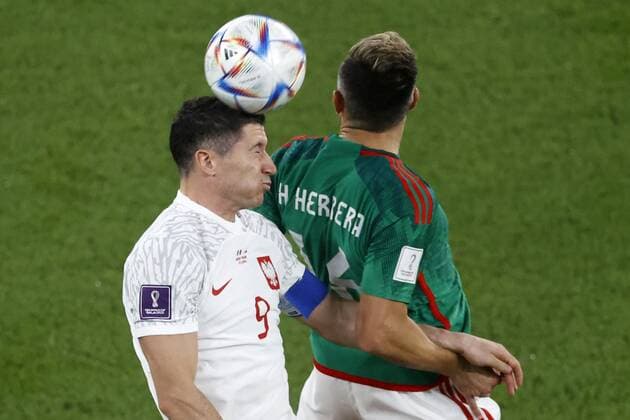 RECORD DATE NOT STATED FIFA World Cup, WM, Weltmeisterschaft, Fussball Qatar 2022 Mexico vs Poland (L-R), Robert Lewandowski of Poland and Hector Herrera of Mexico during the game Mexican national team, Nationalteam (Mexico) vs Poland, Corresponding to Group C of the FIFA World Cup Qatar 2022, at 974 Stadium, Ras Abu Aboud, November 22, 2022. <br><br> (I-D), Robert Lewandowski de Polonia y Hector Herrera de Mexico durante el partido Seleccion Nacional Mexicana (Mexico) vs Polonia, correspondiente al Grupo C de la Copa Mundial de la FIFA Qatar 2022, en el Estadio 974, Ras Abu Aboud, 22 de noviembre de 2022. RAS ABU ABOUD DOHA QATAR Copyright: xAndresxPinax 20221122_6422
