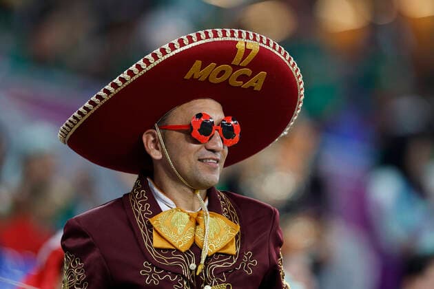 (221122) -- DOHA, Nov. 22, 2022 -- A fan cheers prior to the Group C match between Mexico and Poland of the 2022 FIFA World Cup, WM, Weltmeisterschaft, Fussball at Ras Abu Aboud (974) Stadium in Doha, Qatar, Nov. 22, 2022. ) (SP)QATAR-DOHA-2022 WORLD CUP-GROUP C-MEX VS POL WangxLili 