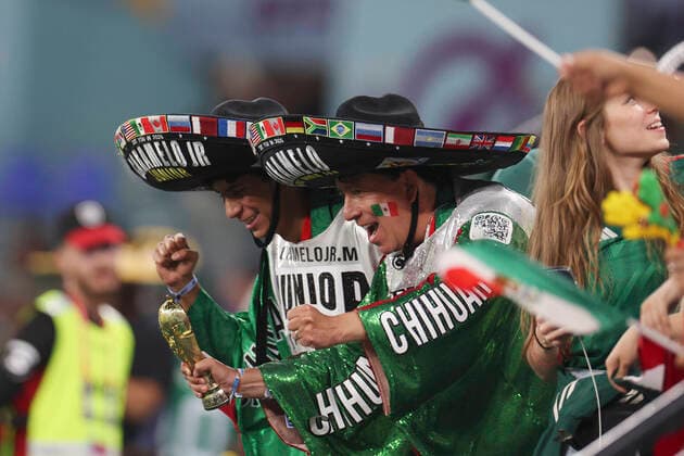 (221122) -- DOHA, Nov. 22, 2022 -- Fans cheer prior to the Group C match between Mexico and Poland of the 2022 FIFA World Cup, WM, Weltmeisterschaft, Fussball at Ras Abu Aboud (974) Stadium in Doha, Qatar, Nov. 22, 2022. ) (SP)QATAR-DOHA-2022 WORLD CUP-GROUP C-MEX VS POL JiaxHaocheng 
