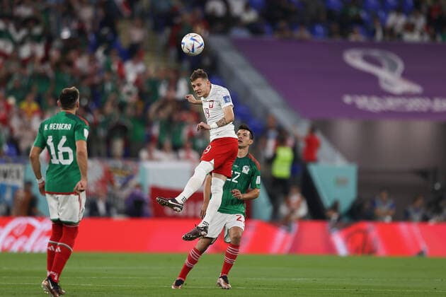 22nd November 2022; Stadium 974, Ras Abu Aboud, Doha, Qatar; FIFA World Cup, WM, Weltmeisterschaft, Fussball Football, Mexico versus Poland; Sebastian Szymanski of Poland heads the ball out of defense  ActionPlus12451849 JohnxPatrickxFletcher