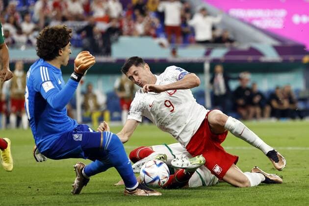DOHA LR Mexico goalkeeper Guillermo Ochoa, Robert Lewandowski of Poland, Hector Moreno of Mexico during the FIFA World Cup Qatar 2022 group C match between Mexico and Poland at 974 Stadium on November 22, 2022 in Doha, Qatar AP Dutch Height MAURICE OF STONE FIFA World Cup Qatar 2022 2022 xVIxANPxSportx xMauricexvanxSteenxWKxIVx 458211403 originalFilename: 458211403.jpg