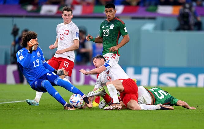 FOOTBALL World Cup 2022 PRE-ROUND GROUP C Mexico Poland 22 11 2022 penalty foul, after the foul there is a penalty for Poland, goalkeeper Guillermo Ochoa li, Mexico foul on Robert Lewandowski center, Poland by Hector Moreno r, Mexico