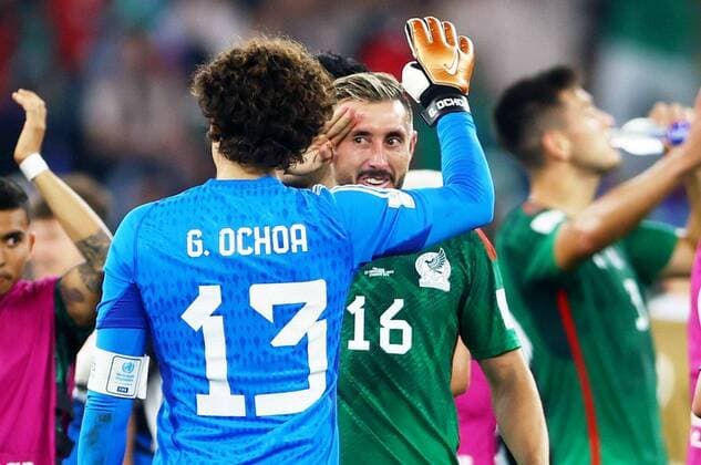 Mandatory Credit: Photo by Kieran McManus Shutterstock (13626428bx) Hector Herrera of Mexico salutes Goalkeeper Guillermo Ochoa of Mexico at full time after he saved a penalty. Mexico v Poland, FIFA World Cup, WM, Weltmeisterschaft, Fussball 2022, Group C, Football, Stadium 974, Doha, Qatar - 22 Nov 2022 Editorial Use Only Mexico v Poland, FIFA World Cup 2022, Group C, Football, Stadium 974, Doha, Qatar - 22 Nov 2022 Editorial Use Only Copyright: xKieranxMcManus Shutterstockx 13626428bx