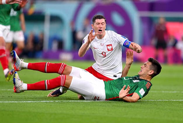 FOOTBALL World Cup 2022 PRE-ROUND GROUP C Mexico Poland 22 11 2022 Robert Lewandowski left, Poland vs. Cesar Montes right, Mexico