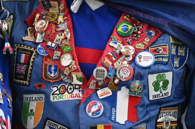 Qatar Soccer World Cup France - Australia 8322072 22.11.2022 Pins and patches are seen at the jacket of a France s supporter before the start of the Qatar 2022 World Cup Group D soccer match between France and Australia at the Al Janoub Stadium in Al-Wakrah, Qatar. Grigory Sysoev Sputnik Al Wakrah Qatar  Copyright: xGrigoryxSysoevx