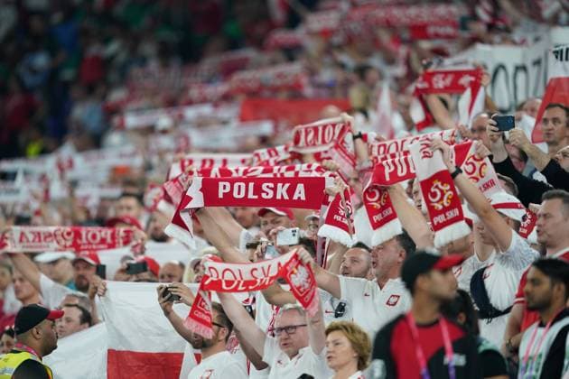 Doha, Qatar, 22nd November 2022. Poland supporters during the FIFA World Cup, WM, Weltmeisterschaft, Fussball 2022 match at Stadium 974, Doha. Picture credit should read: Florencia Tan Jun Sportimage EDITORIAL USE ONLY. No use with unauthorised audio, video, data, fixture lists, club league logos or live services. Online in-match use limited to 120 images, no video emulation. No use in betting, games or single club league player publications. SPI-2057-0014