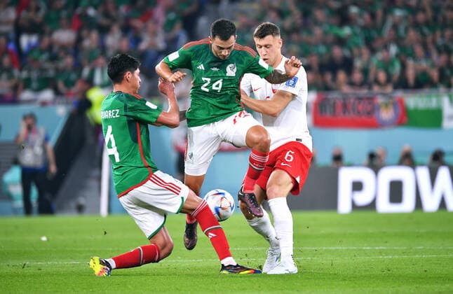 Football, World Cup, 2022, Men, Qatar, Group C, Matchday 1, Stadium 974 Mexico Poland 0 0 Edson Alvarez MEX , Luis Chavez MEX , Krystian Bielik POL Action FIFA REGULATES PROHIBIT ANY USE OF PHOTOGRAPHS AS IMAGE SEQUENCES AND OR QUASI VIDEO