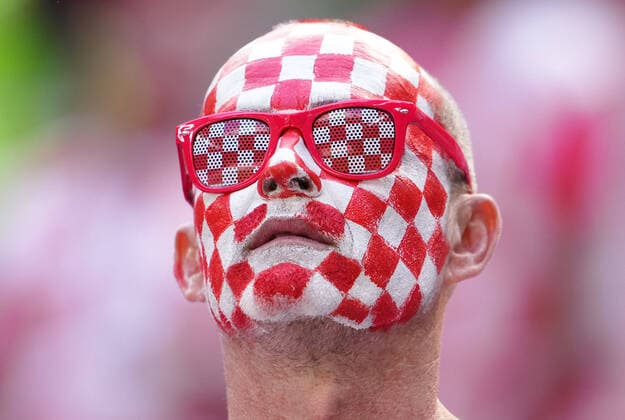 (221123) -- AL KHOR, Nov. 23, 2022 -- A fan reacts before the Group F match between Morocco and Croatia at the 2022 FIFA World Cup, WM, Weltmeisterschaft, Fussball at Al Bayt Stadium in Al Khor, Qatar, Nov. 23, 2022. ) (SP)QATAR-AL KHOR-2022 WORLD CUP-GROUP F-MAR VS CRO ZhengxHuansong 