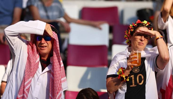 Sport Bilder des Tages Doha, Qatar, 23rd November 2022. German fans during the FIFA World Cup, WM, Weltmeisterschaft, Fussball 2022 match at Khalifa International Stadium, Doha. Picture credit should read: David Klein Sportimage EDITORIAL USE ONLY. No use with unauthorised audio, video, data, fixture lists, club league logos or live services. Online in-match use limited to 120 images, no video emulation. No use in betting, games or single club league player publications. SPI-2058-0008