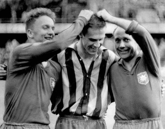 Stockholm 1959 05 31 Agne Simonsson and Gunnar Gren catch Djurgardens goal maker Tumba Johansson who in turn with his two goals beat Örgryte Stockholm Sweden x29x  Copyright: xRolandxJansson DN TTx SIMONSSON-JOHANSSON-GREN
