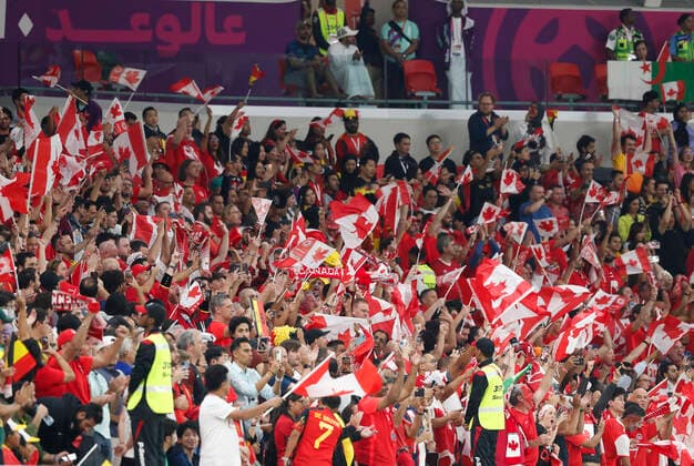 Belgium v Canada 2022 FIFA World Cup, WM, Weltmeisterschaft, Fussball Canada fans wave flags during the national anthem before the 2022 FIFA World Cup Group F match at Ahmad Bin Ali Stadium, Al-Rayyan Content Not Available For UK Newspapers Copyright: xPaulxChestertonx FIL-17640-0036 UK Newspapers OUT